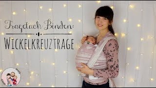 Tragetuch Binden WICKELKREUZTRAGE Neugeborenes Baby  Anleitung [upl. by Nalrah694]