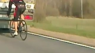 Cyclist speeds at 90kph on motorway after getting caught in the slipstream of a lorry [upl. by Combs]