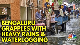 Unexpected Rains Cause Waterlogging amp Traffic Chaos In Bengaluru  N18V  CNBC TV18 [upl. by Enaffit406]