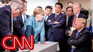 Merkel speaks out about viral Trump photo [upl. by Ennailuj]