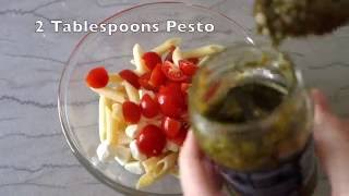 Pesto Caprese Pasta Salad Recipe [upl. by Ilil]