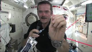 Chris Hadfield demonstrates how astronauts wash their hands in zerog [upl. by Htebazie]