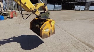 Gyro Star Screener bucket use and review on backhoe loader [upl. by Oremodlab]