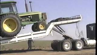 Landoll tilt bed trailer loading the tractor [upl. by Deadman858]