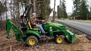 How To Install A Culvert Pipe With A John Deere 1023e [upl. by Nannerb845]