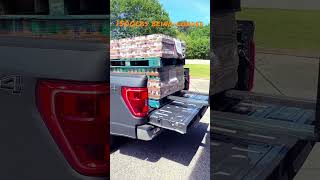 Testing the payload of the 2022 Ford F150 1500 lbs of canned goods being loaded ford f150 [upl. by Morril]