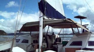 Tangaroa wharram catamaran Motor sailing in the rain [upl. by Bail]