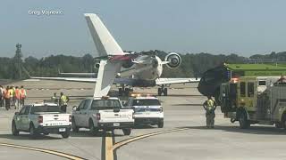 Delta flight clips another plane on taxiway knocks off smaller planes tail [upl. by Suh830]