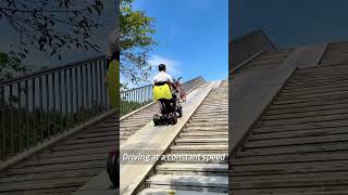 This autobalancing power chair smoothly handles steep slopes [upl. by Aneeram559]