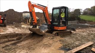 Mini Excavator working with very wet mud [upl. by Xantha]