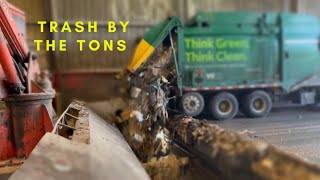 Watch Garbage trucks dumping Tons of Trash in the Hole [upl. by Iliak533]