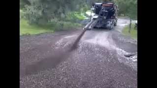 CAD Oklahoma quotStone Slinger Rock Shooterquot Spreading compost on construction entrance driveway [upl. by Atirrehs]