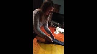 How to fold a surgical gown and fenestrated drape [upl. by Lanni]