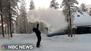 WATCH Boiling water turns into snow and ice in freezing Finland [upl. by Anelahs649]