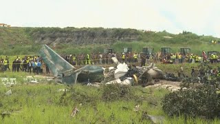 Investigators collect recorders at Nepals plane crash site as soldiers remove bodies of victims [upl. by Kirit]