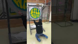 Man is tufting a custom rug with the logo for Bill Wave [upl. by Bevers]